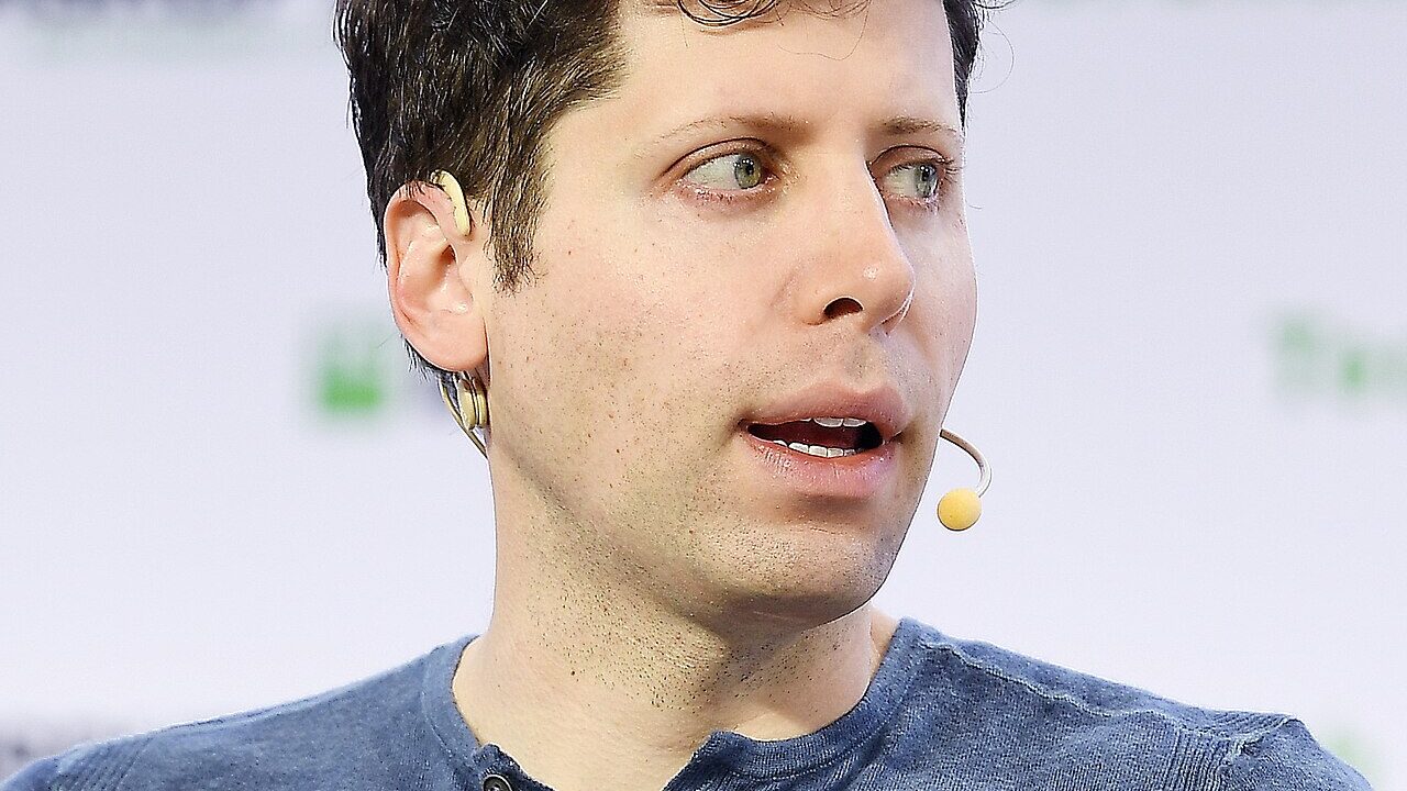 OpenAI chief executive Sam Altman speaking on stage
