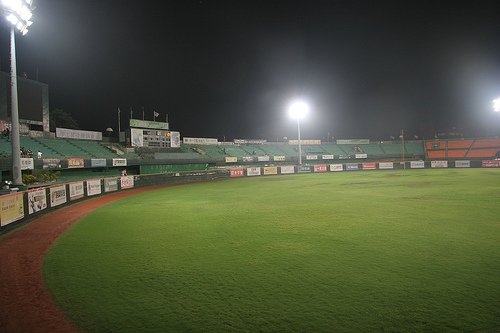 Night baseball stadium under lights