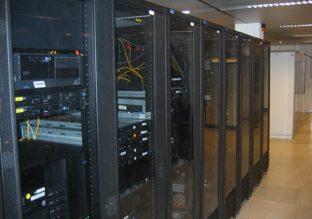 Server racks in a data centre. Photo: Wil Weterings, public domain, via Wikimedia Commons.