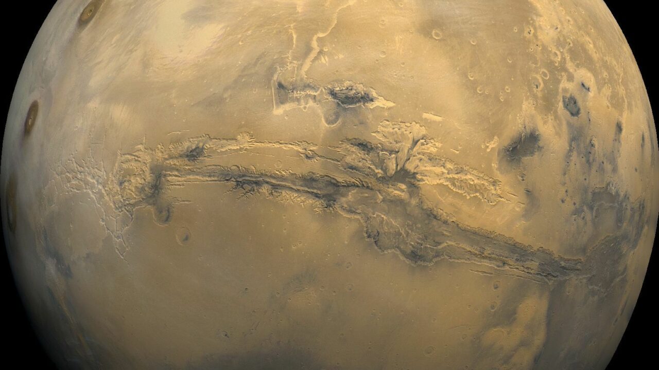 Mars and the Valles Marineris canyon system. Photo: NASA, public domain, via Wikimedia Commons.