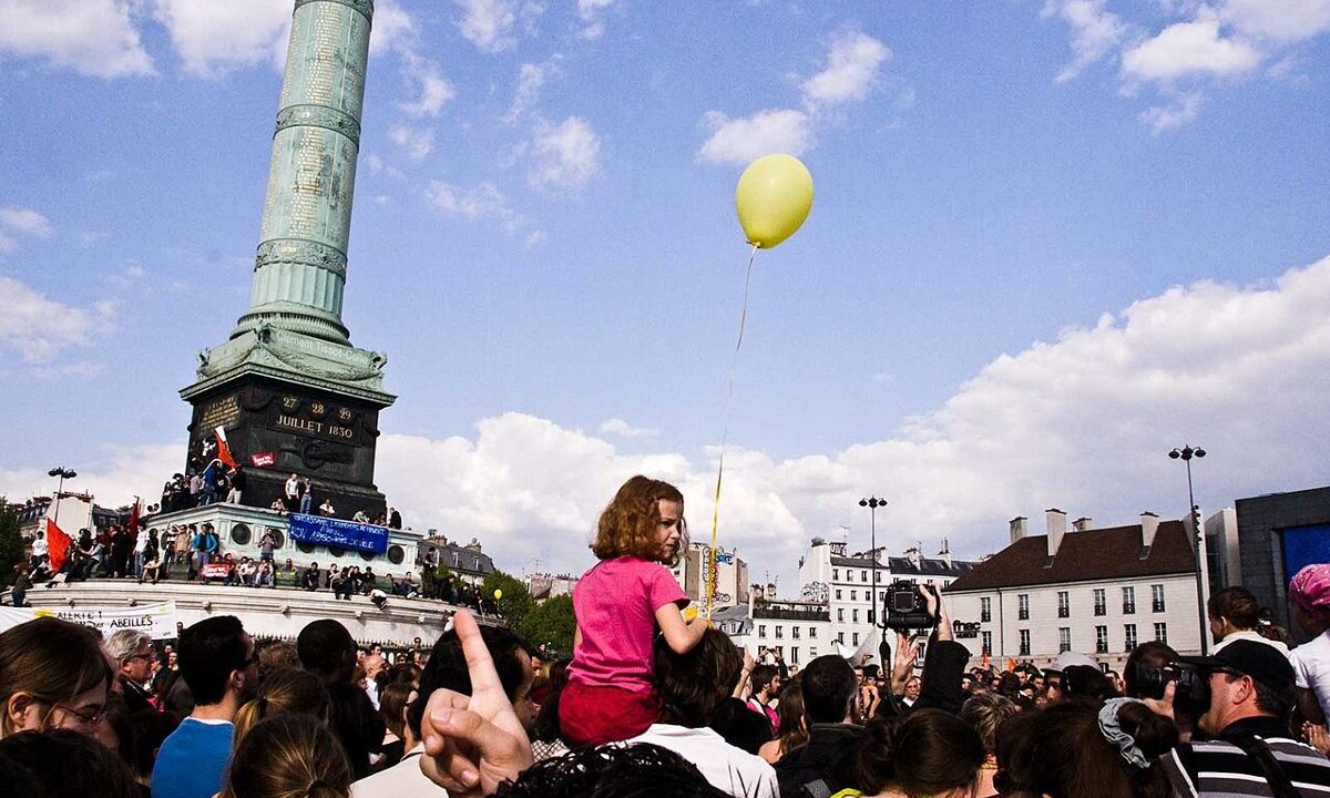 Crowd gathered at Place de la Bastille in Paris during a protest