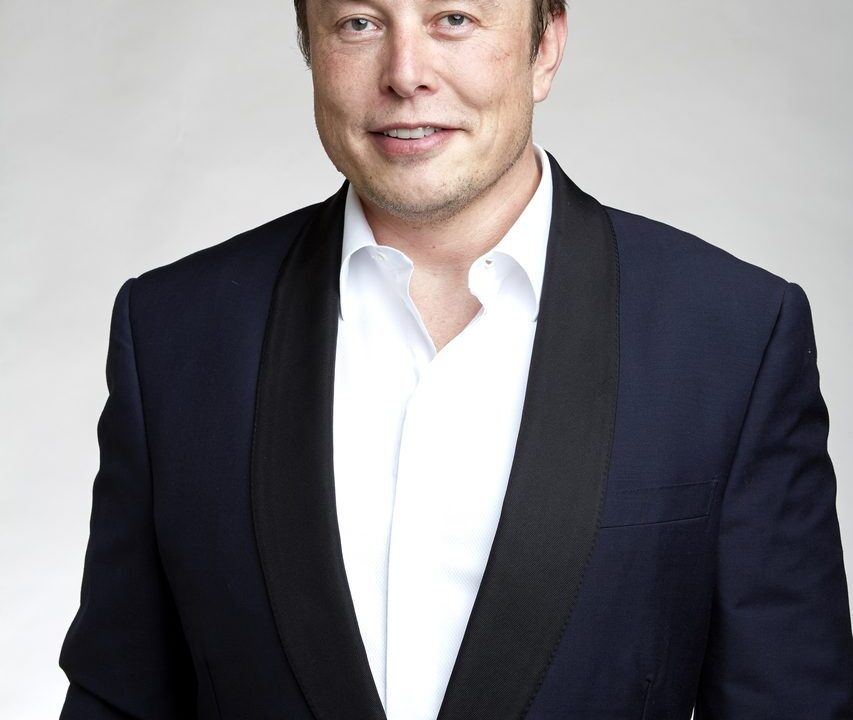Elon Musk portrait in a dark suit